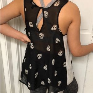 Sleeveless tank tunic style. Ladies size large.